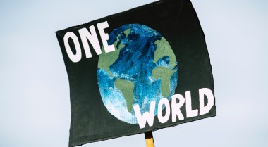One world protest sign