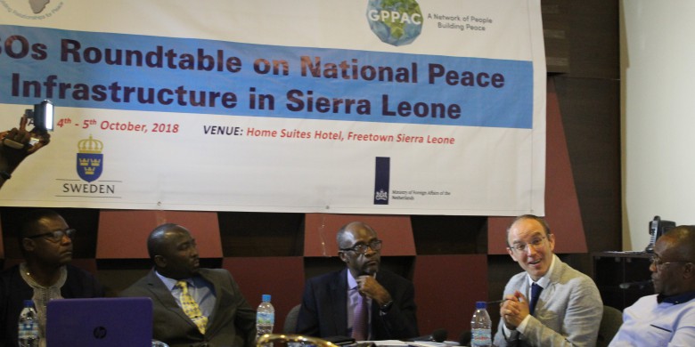 A picture taken during the discussion at the Roundtable on National Peace Infrastructures in Sierra Leone, from left to right: Mr. Charles Lahai, director of PAACET, Hon. Solomon Jamiru, the Deputy Minister of Information and Communication, Dr. Sam Doe, Country Director UNDP, and Mr. Pascal Richard, GPPAC Managing Adviser Policy and Advocacy.