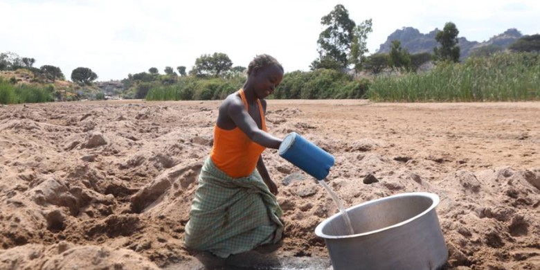 Due to the semi-aridity of the area, water is scarce. One of the coping mechanisms is to scoop water from sand.