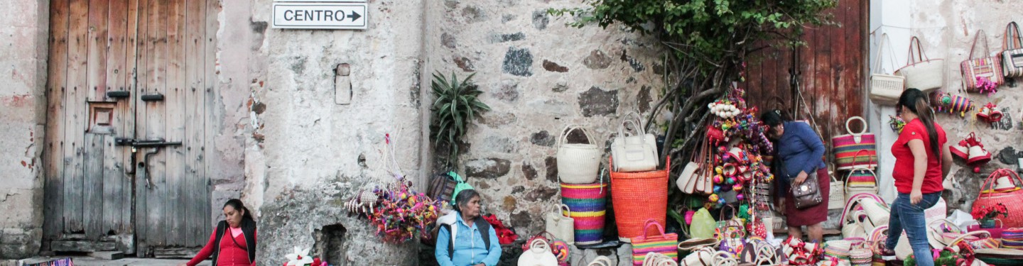 Women selling arts and crafts in Taxco, Mexico