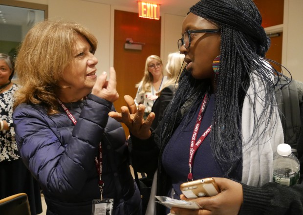 Two women discussing