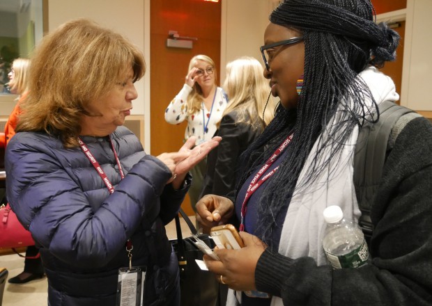 Two woman talking together at the UN