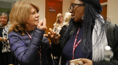 Two women discussing