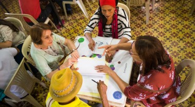 GPPAC Members Colombia sitting around a table 